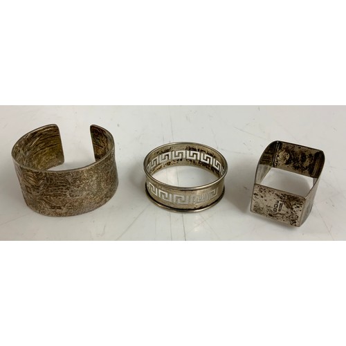 285 - 3 HALLMARKED SILVER SERVIETTE RINGS 97g