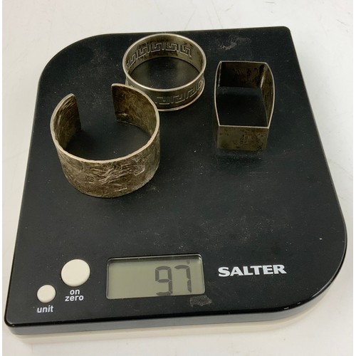 285 - 3 HALLMARKED SILVER SERVIETTE RINGS 97g