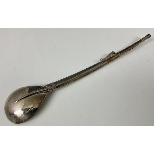 369 - ARTS AND CRAFTS STYLE SILVER HONEY SPOON, POSSIBLY ASPREY AND CO, APPROX. 69.5g, 22.5 cm