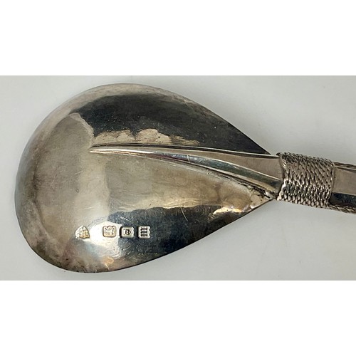 369 - ARTS AND CRAFTS STYLE SILVER HONEY SPOON, POSSIBLY ASPREY AND CO, APPROX. 69.5g, 22.5 cm