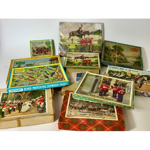 96 - 10 WOODEN JIGSAWS FEATURING SOLDIER/HORSE THEME AND OTHERS. UNCHECKED. VICTORY & OTHERS