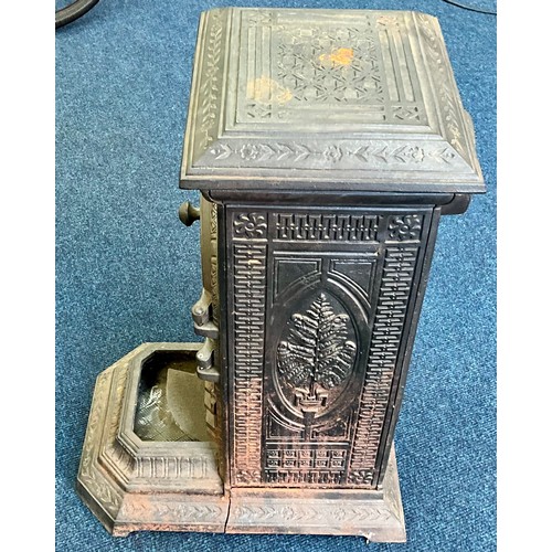 494 - HEAVY CAST IRON FIRE STOVE WOOD BURNER. SOME CRACKING TO BASE. 73cm HIGH