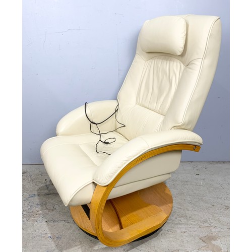 560 - ELECTRICALLY ADJUSTED CREAM LEATHER RECLINING ARMCHAIR AND MATCHING FOOT STOOL