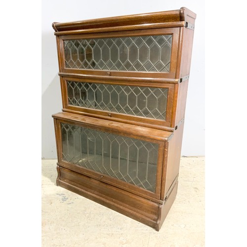 604 - THREE SECTION GLOBE WERNICKE TYPE BOOKCASE WITH LEADED GLASS DOORS WIDTH 87cm