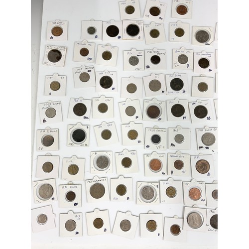 402 - TRAY OF MISC. COINS MOSTLY IN DISPLAY POUCHES