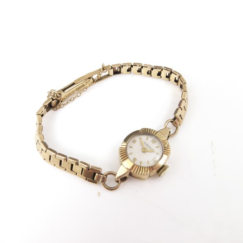 447 - LADIES 9CT GOLD TISSOT WRISTWATCH ON A HALLMARKED 9CT GOLD STRAP, APPROX. 13.5g gross