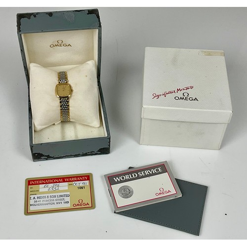 452 - LADIES OMEGA DEVILLE WRIST WATCH, SQUARE CHAMPAGNE DIAL ON BIMETAL STRAP WITH ORIGINAL BOX AND PAPER... 