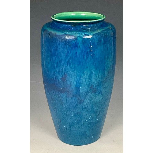 68 - POSSIBLY EARLY RUSKIN BLUE GLAZED VASE OF SHOULDERED OVOID FORM WITH SCISSOR MARK TO BASE, APPROX. 3... 