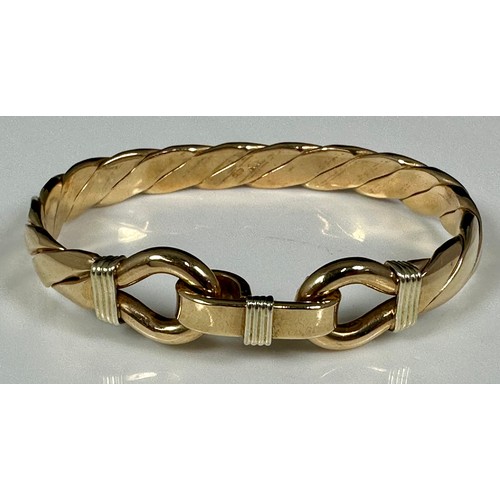 543 - VERY COMMERCIAL HEAVY 9ct GOLD BANGLE IN THE FORM OF A HORSE’S BIT IN FITTED G.L.BICKNELL BOX, APPRO... 