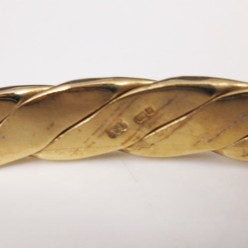 543 - VERY COMMERCIAL HEAVY 9ct GOLD BANGLE IN THE FORM OF A HORSE’S BIT IN FITTED G.L.BICKNELL BOX, APPRO... 