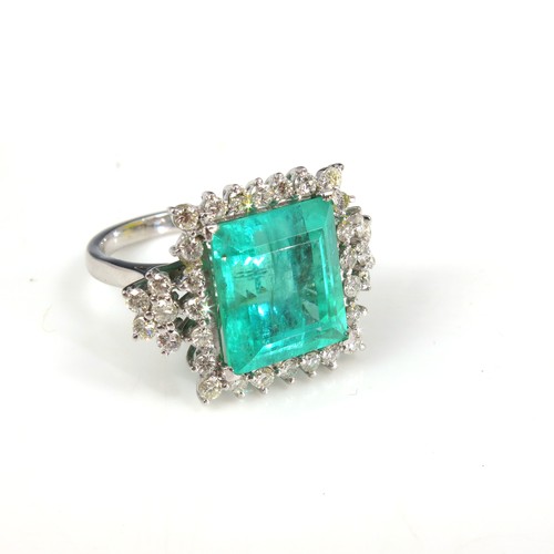 610 - VERY IMPRESSIVE DECO STYLE EMERALD AND DIAMOND RING FEATURING A LARGE SQUARE CUT EMERALD, APPROX. 13... 