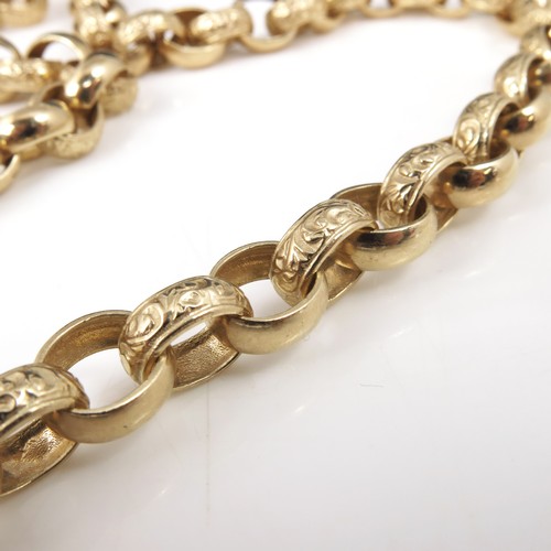 560 - HEAVY 9CT GOLD NECKLACE WITH ROUND ALTERNATELY ENGRAVED LINKS, APPROX. 80g