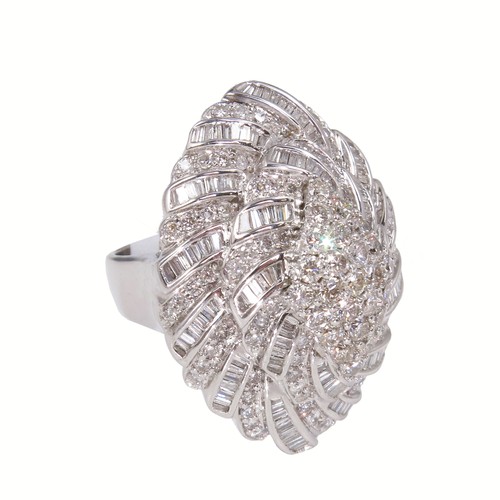 609 - A SPECTACULAR MARQUISE SHAPED DIAMOND DRESS RING OF MORE THAN 200 BAGUETTE AND BRILLIANT CUT STONES ... 