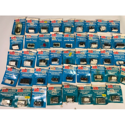 320 - PECO MODEL RAILWAY ACCESSORIES, 4 POINT MOTORS, 10 MAGNETIC DECOUPLERS, PLUS 30 OTHERS INC. ISOLATIN... 