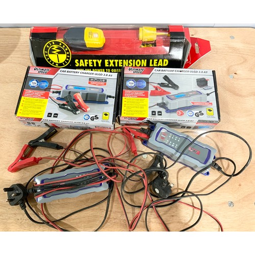 487 - CAR BATTERY CHARGER PACKS  & A SAFETY EXTENSION LEAD