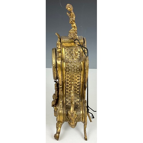 240 - ORNATE GILT METAL MANTEL CLOCK