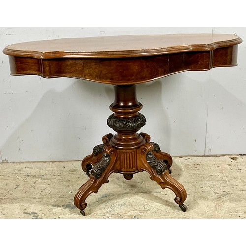 640 - SERPENTINE FORM MAHOGANY CENTRE TABLE ON CARVED PEDESTAL WITH FOUR LEG SUPPORT