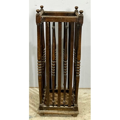 667 - DARK OAK STICK STAND. 76cm high x 28cm wide