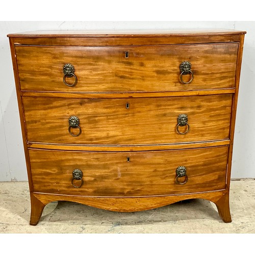 594 - BOW FRONT CHEST OF THREE DRAWERS ON SPLAY BRACKET FEET WITH LION MASK HANDLES. 65cm h x 92cm w x 47c... 