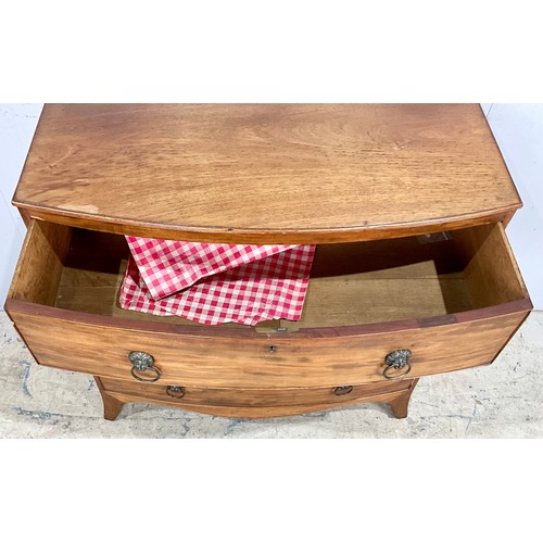 594 - BOW FRONT CHEST OF THREE DRAWERS ON SPLAY BRACKET FEET WITH LION MASK HANDLES. 65cm h x 92cm w x 47c... 