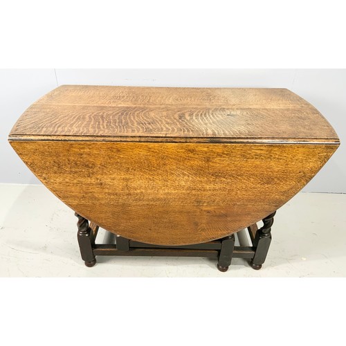 637 - OAK DROP LEAF DINING TABLE WITH BARLEY TWIST LEGS 150cm x 115cm