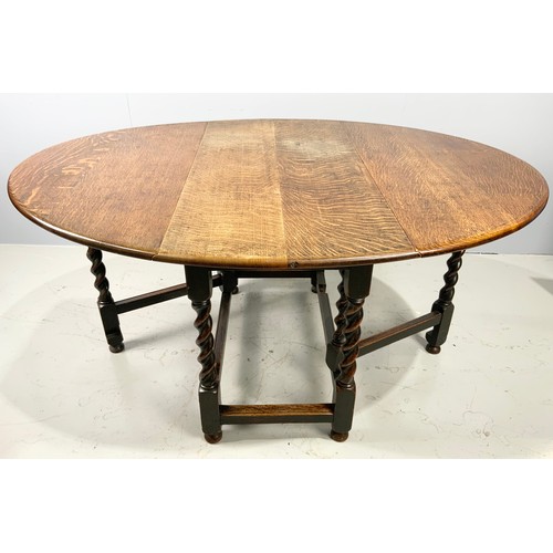 637 - OAK DROP LEAF DINING TABLE WITH BARLEY TWIST LEGS 150cm x 115cm