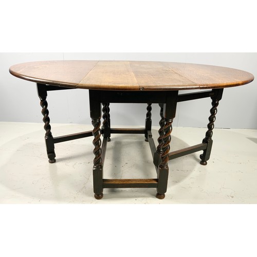 637 - OAK DROP LEAF DINING TABLE WITH BARLEY TWIST LEGS 150cm x 115cm