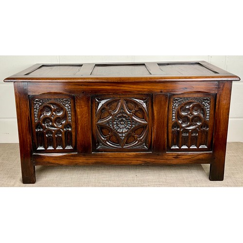 592 - CARVED OAK CHEST 103cm L x 47cm D x 53cm H