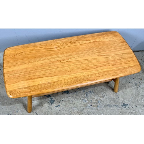 544 - ERCOL TYPE BLOND COFFEE TABLE. Approx. 105 x 50cm