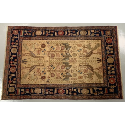 715 - UNUSUAL RED GROUND RUG WITH GEOMETRIC ANIMAL PATTERN 215cm x148cm