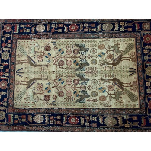 715 - UNUSUAL RED GROUND RUG WITH GEOMETRIC ANIMAL PATTERN 215cm x148cm