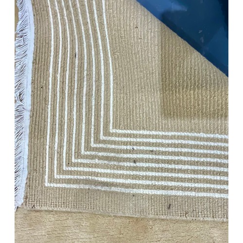 717 - LARGE CREAM GROUND MODERN RUG. Approx. 362 x 275cm