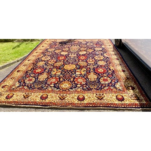 713 - VERY LARGE BLUE GROUND EMIR WOOL RUG. Approx. 394 x 300cm