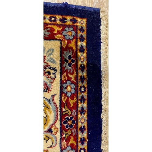 713 - VERY LARGE BLUE GROUND EMIR WOOL RUG. Approx. 394 x 300cm