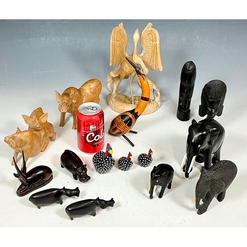 325 - QUANTITY OF CARVED WOODEN ANIMAL FIGURES AND AFRICAN ART