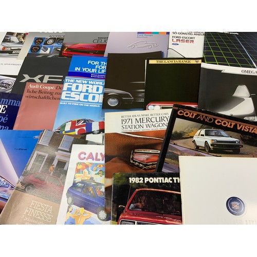 4 - A GOOD SELECTION OF CAR BROCHURES & BOOKLETS