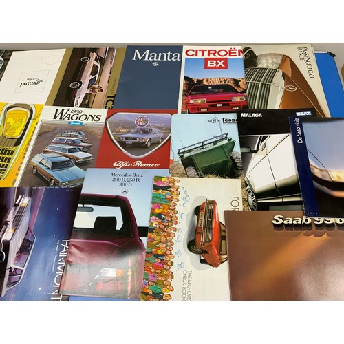 4 - A GOOD SELECTION OF CAR BROCHURES & BOOKLETS