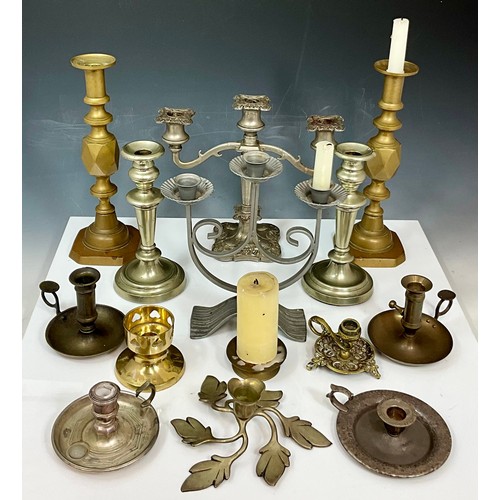 319 - COLLECTION OF CANDLESTICKS