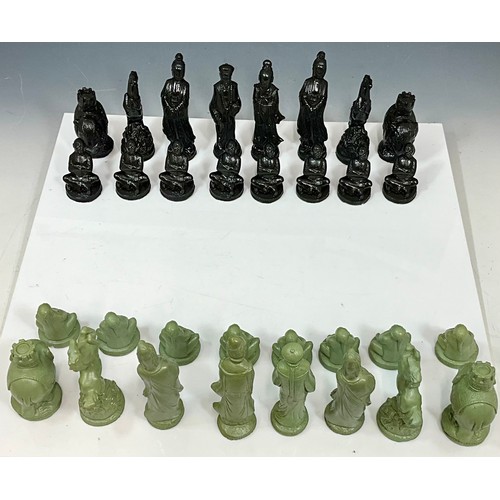 423 - LARGE MODERN MANDARIN CHESS PIECES SET IN BLACK AND JADE GREEN. Tallest Figure Approx. 17cm, Largest... 