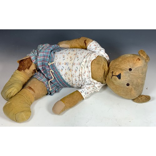 99 - LARGE TEDDY BEAR NAMED “NORMOUS”, THIS IS A STRAW FILLED BEAR AND WE ARE ADVISED THAT IT IS AMERICAN... 