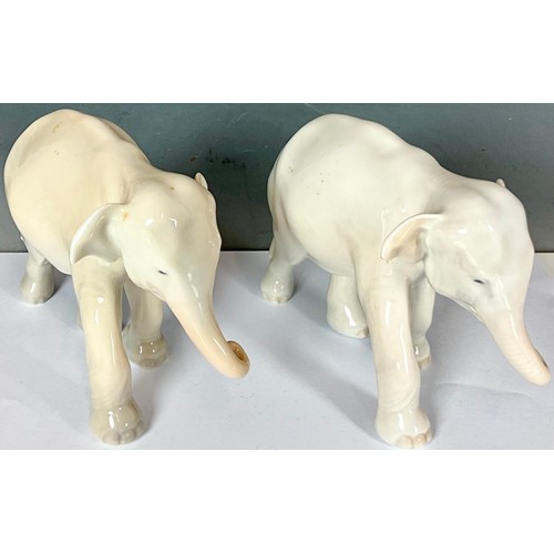 168 - PAIR ROYAL COPENHAGEN ELEPHANTS (TRUNKS DOWN) #599