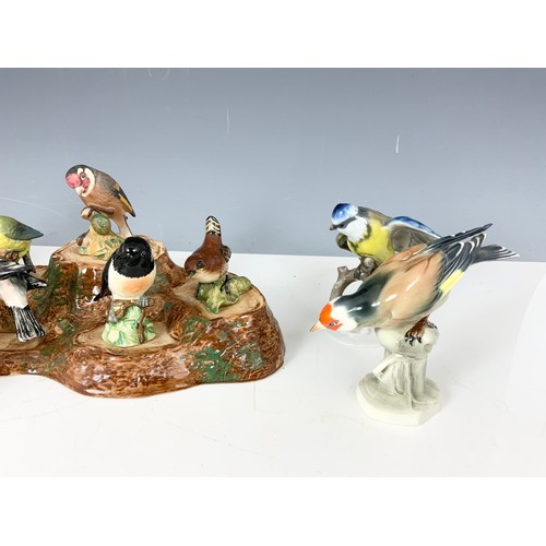 169 - BESWICK , ROYAL WORCESTER ETC BIRD MODELS WITH A BESWICK TREE STUMP DISPLAY STAND