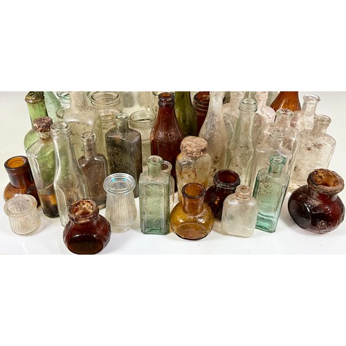 275 - TRAY OF VINTAGE GLASS PRODUCE AND MEDICINAL JARS AND BOTTLES