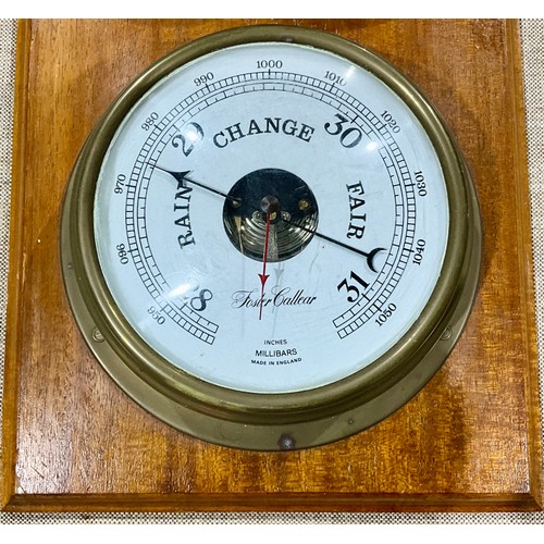 284 - A FOSTER CALLEAR QUARTZ CLOCK AND BAROMETER MOUNTED ON WOODEN WALL PLAQUE