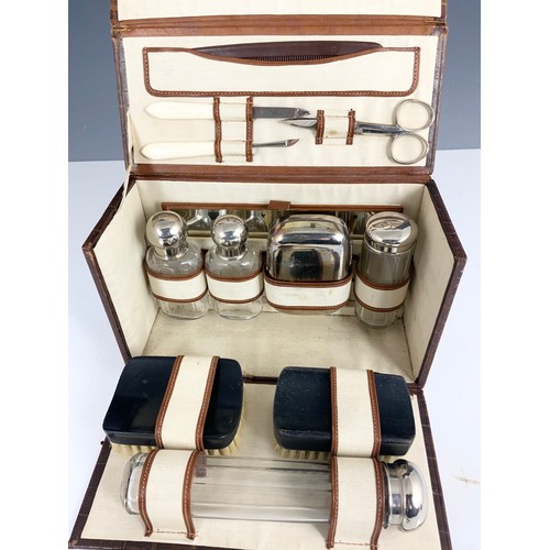 380 - GENTLEMAN’S VANITY TRAVEL CASE WITH FITTED INTERIOR TOGETHER WITH A SILVER BACK DRESSING TABLE BRUSH