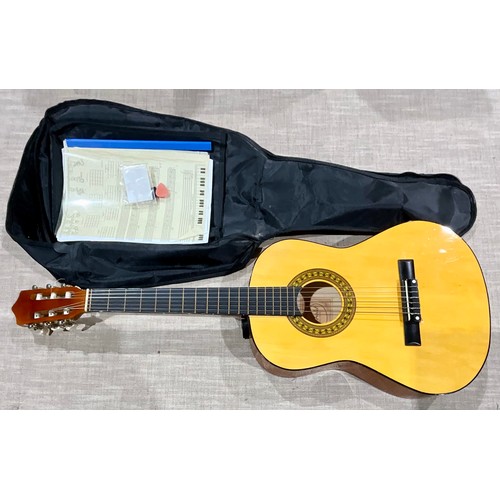 424 - HERALD SMALL CLASSICAL GUITAR MODEL MG104N INC. SOFT CASE AND SHEET MUSIC