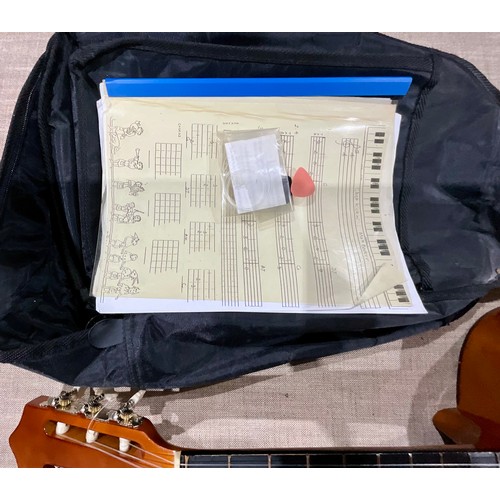 424 - HERALD SMALL CLASSICAL GUITAR MODEL MG104N INC. SOFT CASE AND SHEET MUSIC