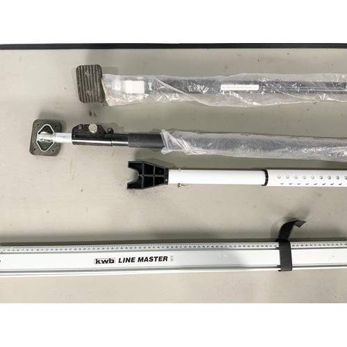 479 - TWO ADJUSTABLE CEILING PROPS, A PATIO DOOR LOCK AND A LINEMASTER SAW GUIDE