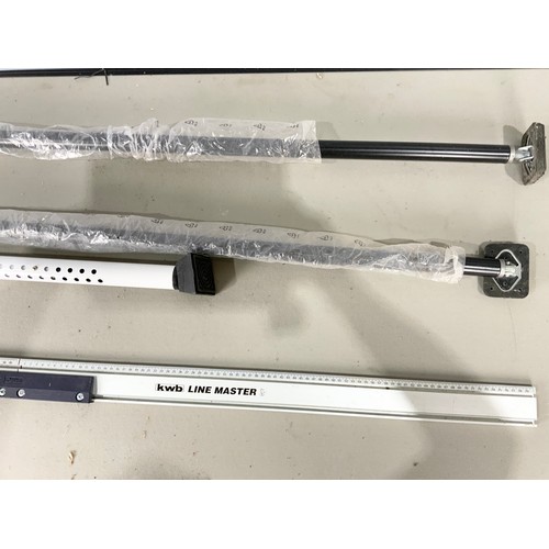 479 - TWO ADJUSTABLE CEILING PROPS, A PATIO DOOR LOCK AND A LINEMASTER SAW GUIDE