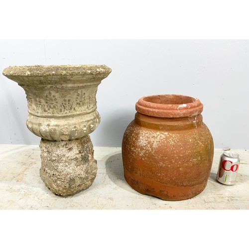 493 - TERRACOTTA  FORCER 33cm TALL WITH  A GARDEN URN 42cm TALL